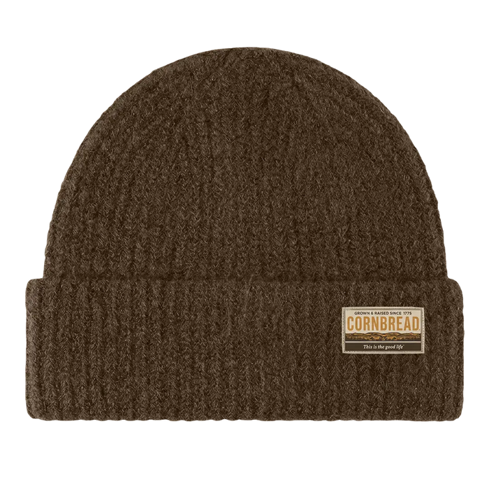 Brown knit beanie with a label on a white background