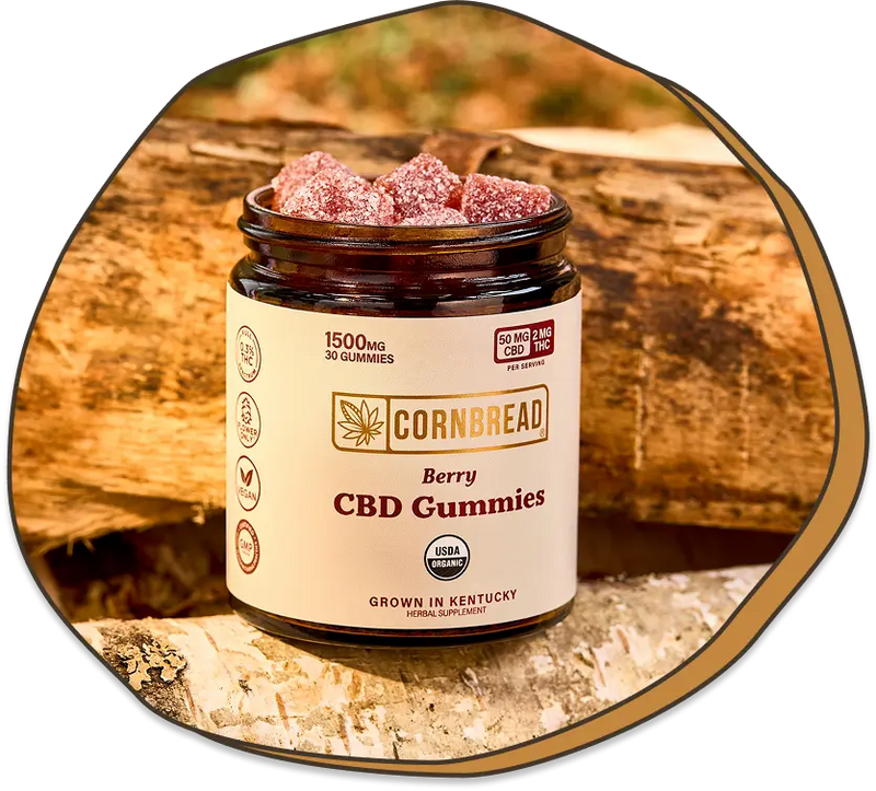 Jar of Cornbread Berry CBD Gummies on a wooden background